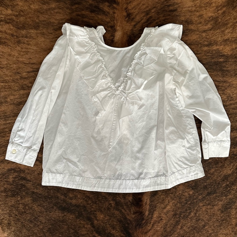 White work blouse with ruffles